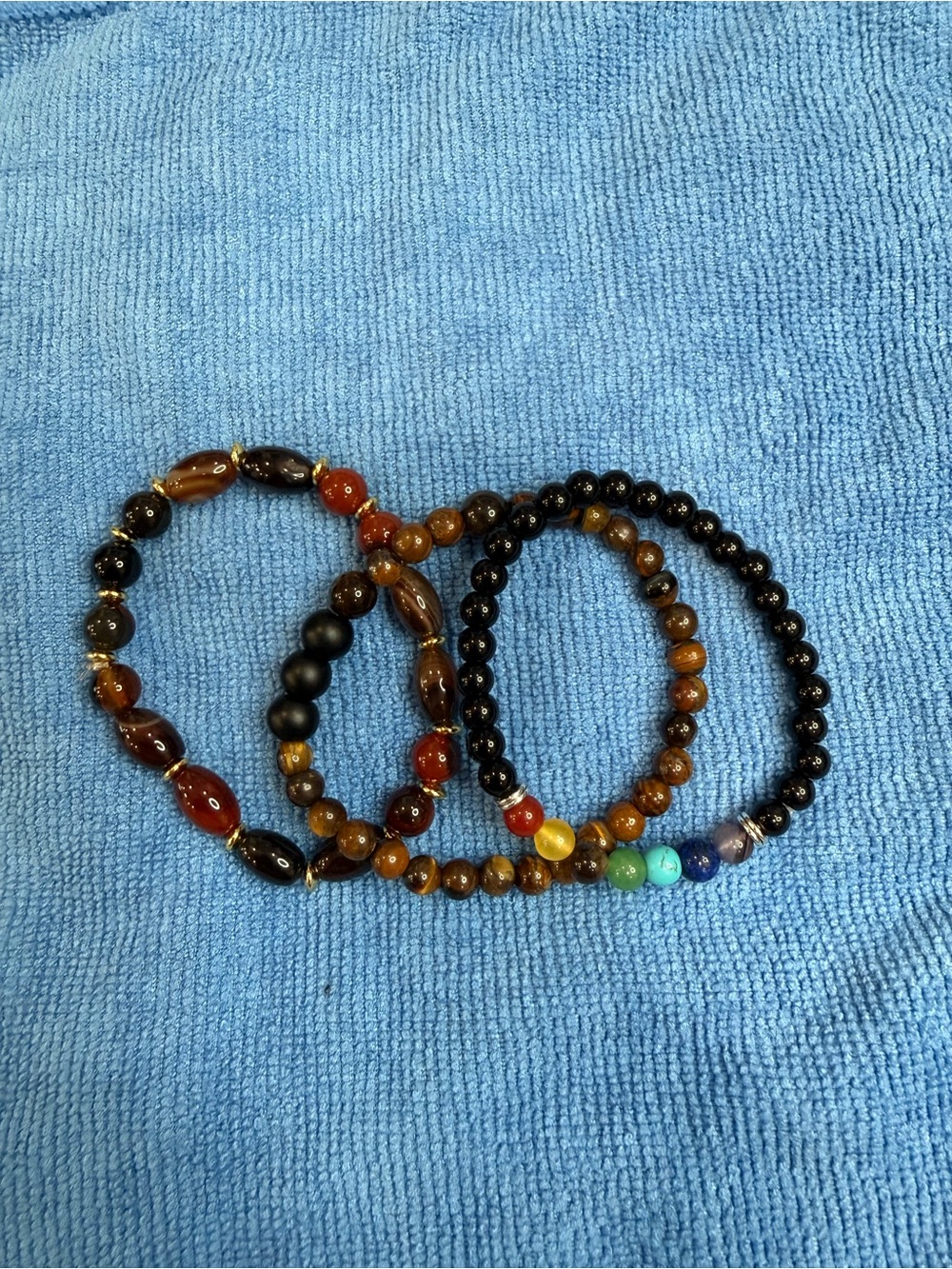 Set of Four Beaded Stretch Bracelets - Black, Brown, Red, Multicolor Accents